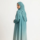 Side profile of Ocean Fade Ombre Gown highlighting the silhouette