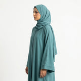 Styled look of Ocean Fade Ombre Gown, perfect for semi-formal wear, boutique modest wear, and casual luxury outings