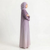 Styled look of Royal Mauve Fade Gown, perfect for semi-formal wear, boutique modest wear, and casual luxury gatherings