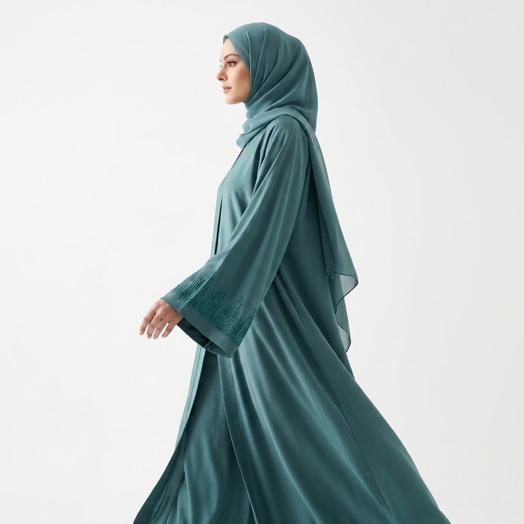 Sleeve cuff detail of Aqua Sky Turquoise DMC Abaya with stone trim