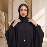 Close-up detail of Fabric-Covered Button Placket Kaftan showcasing the design work