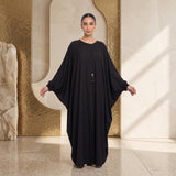 Side profile of Fabric-Covered Button Placket Kaftan highlighting the silhouette