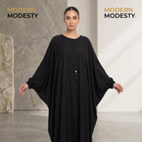 Full-length view of Fabric-Covered Button Placket Kaftan in Deep Jet Black