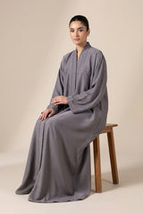 Full-length view of Slate Embroidered Butterfly Rhinestone Coat in Classic Slate Grey with Matching Thread Embroidery & Iridescent DMC Rhinestone Accents