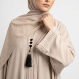 Side view of Champagne Beige Pintuck Panel Gown modest abaya