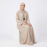 Back view of Champagne Beige Pintuck Panel Gown