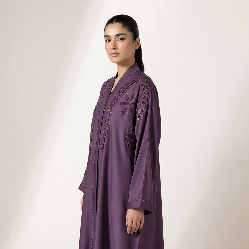 Side profile of Luminous Embellished Coat highlighting the silhouette