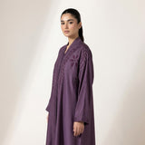 Side profile of Luminous Embellished Coat highlighting the silhouette