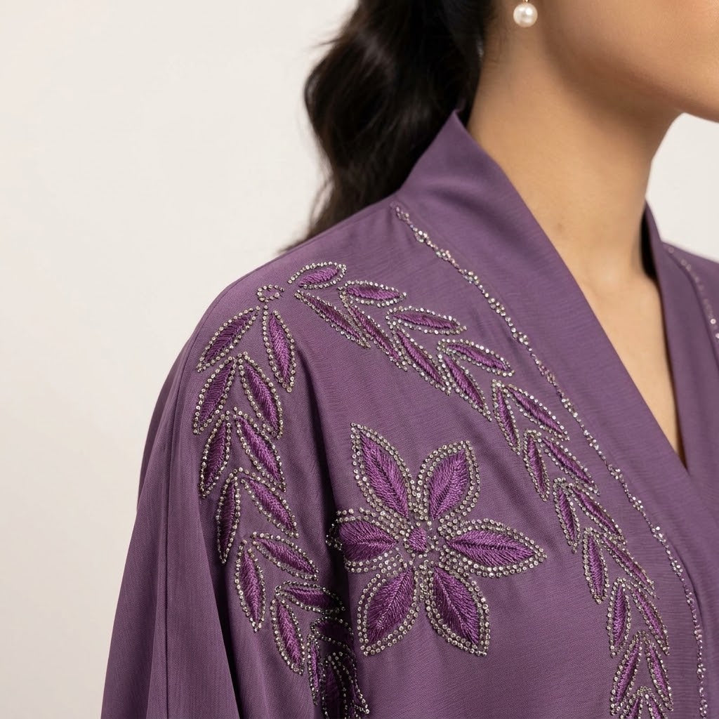 Full-length view of Luminous Embellished Coat in Dusty Mauve / Muted Purple with Tone-on-Tone Thread Embroidery & Silver DMC Rhinestone Accents