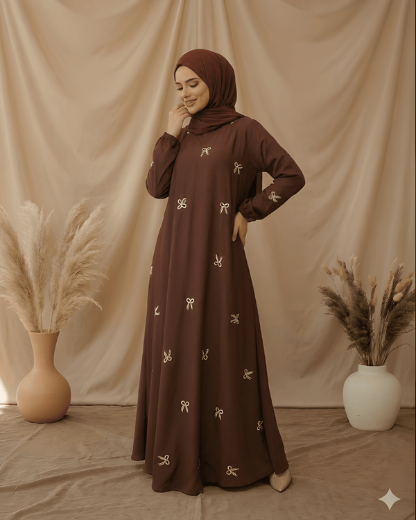 Velora luxury satin abaya in warm mocha brown with cream bow accent and matching hijab — Bin Ibrahim Pakistan