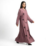 Front view of Mauve Ribbon Abaya - premium * Premium Crinkle-Textured Zoom Fabric (Lightweight, breathable, and iron-easy with a subtle horizontal weave) * *Silhouette:* Flowy, relaxed A-line fit offering full modest coverage modest wear