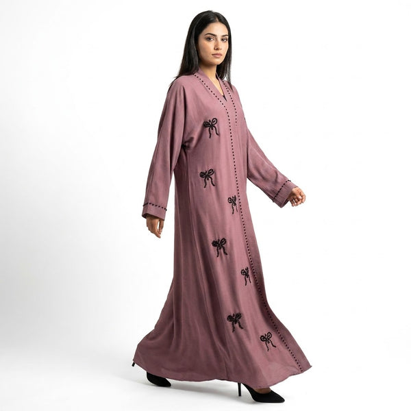 Front view of Mauve Ribbon Abaya - premium * Premium Crinkle-Textured Zoom Fabric (Lightweight, breathable, and iron-easy with a subtle horizontal weave) * *Silhouette:* Flowy, relaxed A-line fit offering full modest coverage modest wear