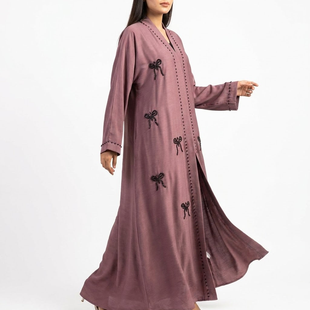 Side profile of Mauve Ribbon Abaya highlighting the silhouette