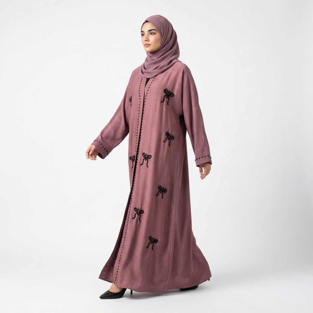 Full-length view of Mauve Ribbon Abaya in signature colorway