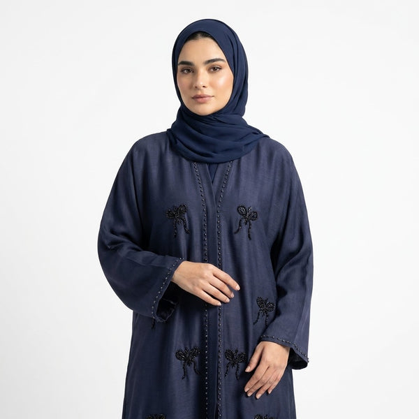 Side profile of Hand-Crafted Cut-Dana Bow Abaya highlighting the silhouette