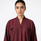 Close-up detail of Hand-Crafted Cut-Dana Bow Abaya 2 showcasing the design work