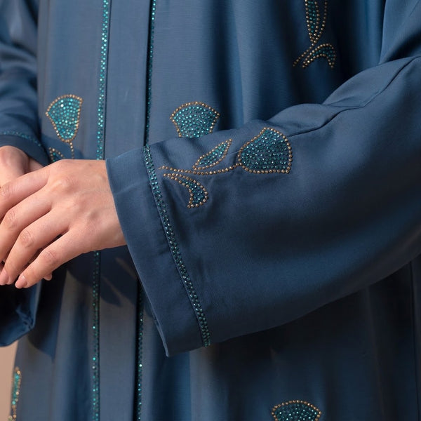 Close-up detail of Peacock Crystal Tulip Coat showcasing the design work