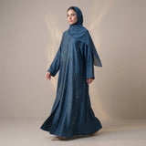 Styled look of Peacock Crystal Tulip Coat, perfect for formal receptions, eid, festive gatherings, and daily luxury wear