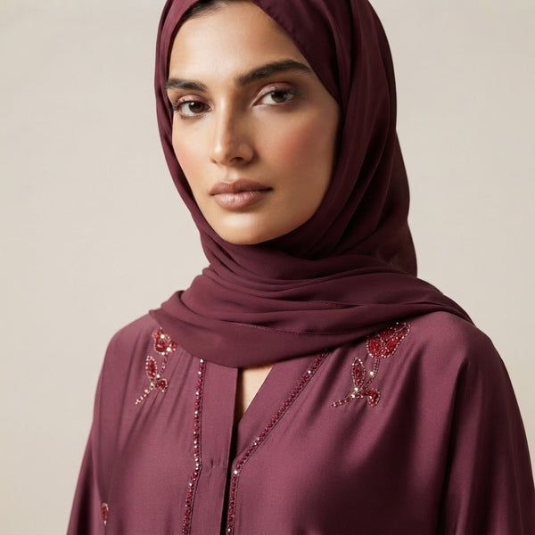 Close-up detail of Plum Crystal Tulip Coat showcasing crystal embellishment