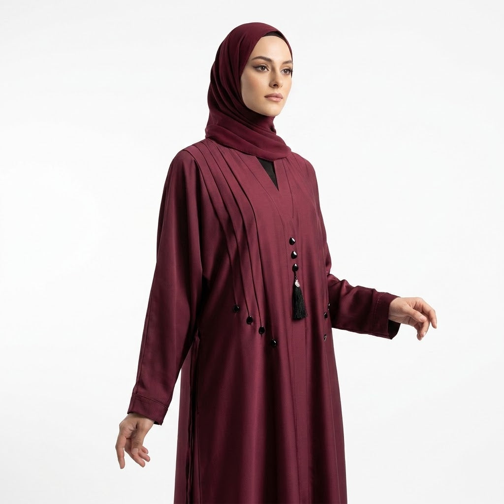 Close-up detail of Deep Maroon Teardrop Studded Coat showcasing pintucks and teardrop studs