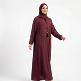 Full length styled look of Deep Maroon Teardrop Studded Coat with waist tie belt