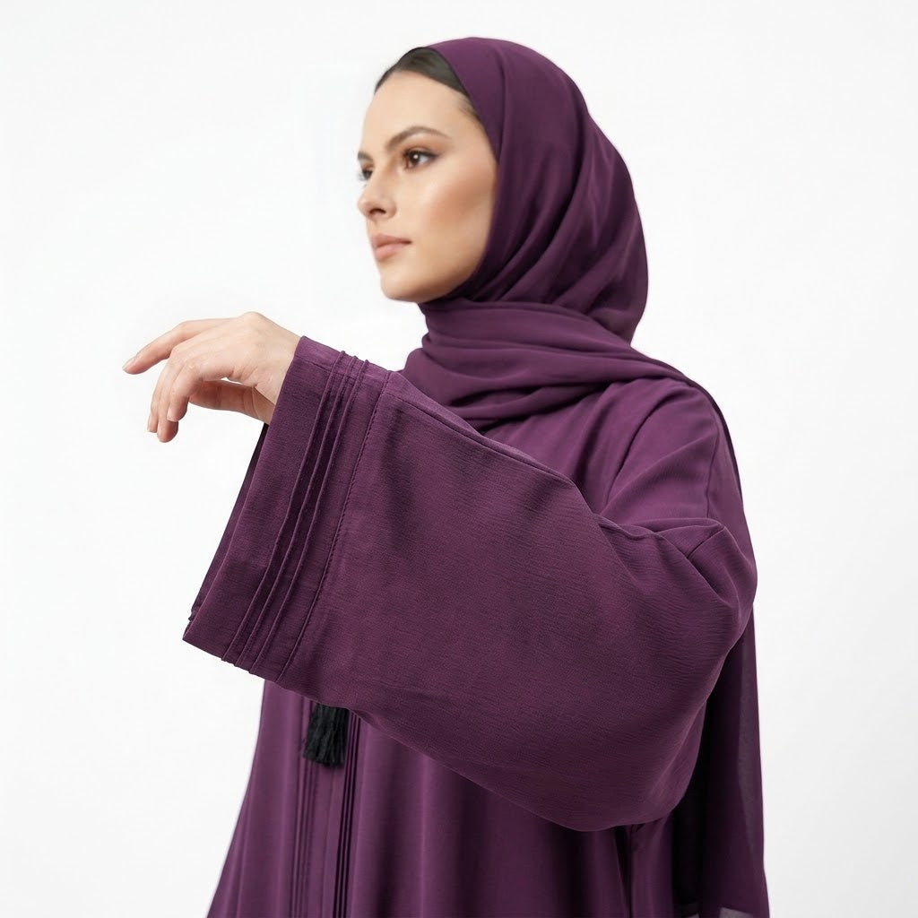 Styled look of Deep Plum Pintuck Panel Gown with waist tie belt