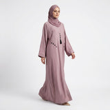 Front view of Dusty Pink Teardrop Studded Coat with black teardrop studs
