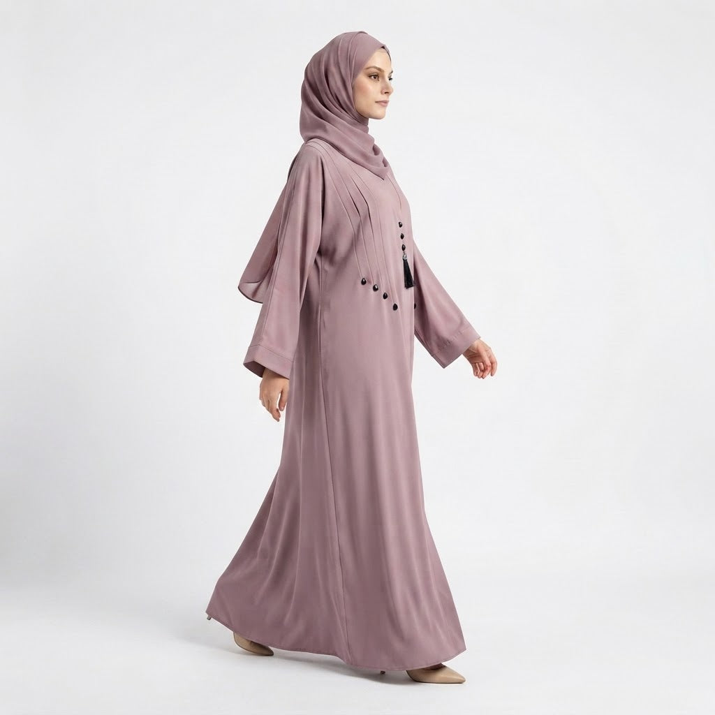 Full-length styled view of Dusty Pink Teardrop Studded Coat with waist tie belt