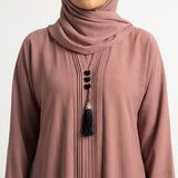 Side view of Dusty Rose Pintuck Panel Gown closed abaya