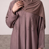 Close-up detail of Dusty Rose Feather Abaya showcasing the DMC stone work