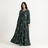 Side profile of Emerald Botanical Floral Gown highlighting the silhouette