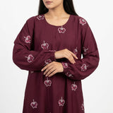 Close-up detail of Maroon Botanical Floral Gown showcasing the design work
