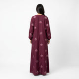 Side profile of Maroon Botanical Floral Gown highlighting the silhouette