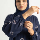 Styled look of Navy Botanical Floral Gown, perfect for semi-formal wear, daily boutique modest wear, and casual outings