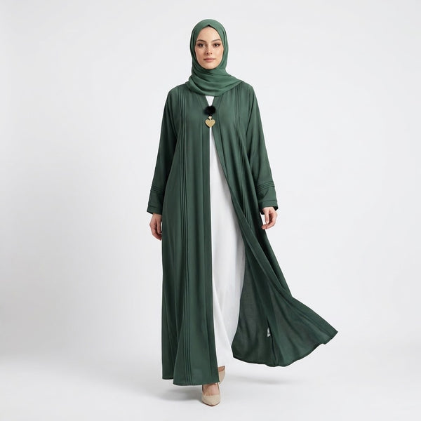 Close-up detail of Emerald Pin-Tuck 2-in-1 Abaya showcasing pin-tuck pleats and heart charm