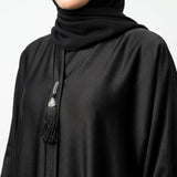 Front view of Jet Black Tassel Coat Abaya - premium TikTok fabric modest wear