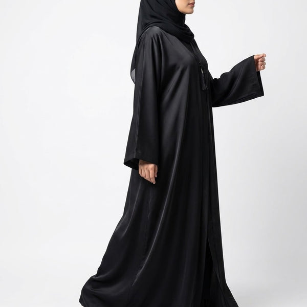 Close-up detail of Jet Black Tassel Coat Abaya showcasing tassel and bead accent