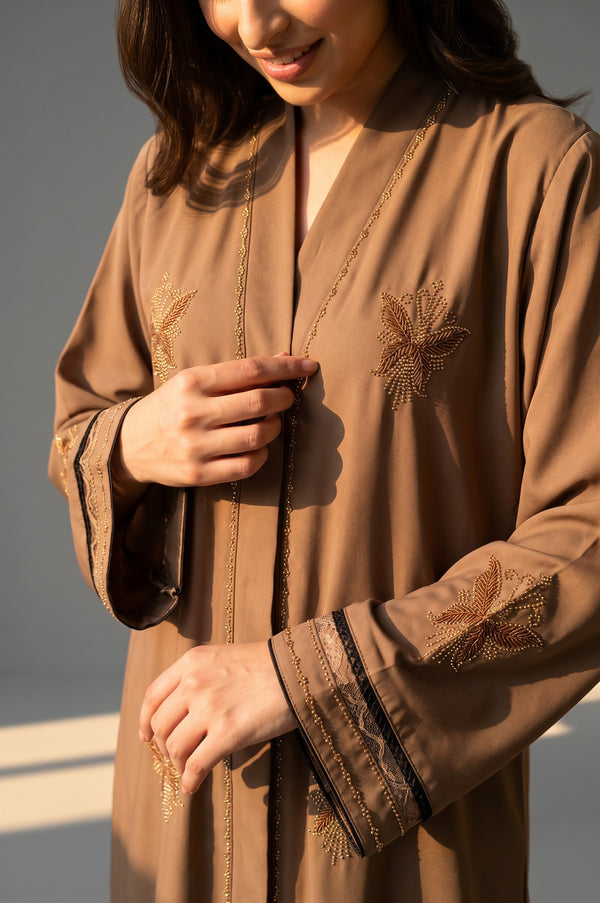 Styled front view of Latte Botanical Open Abaya with tonal embroidery