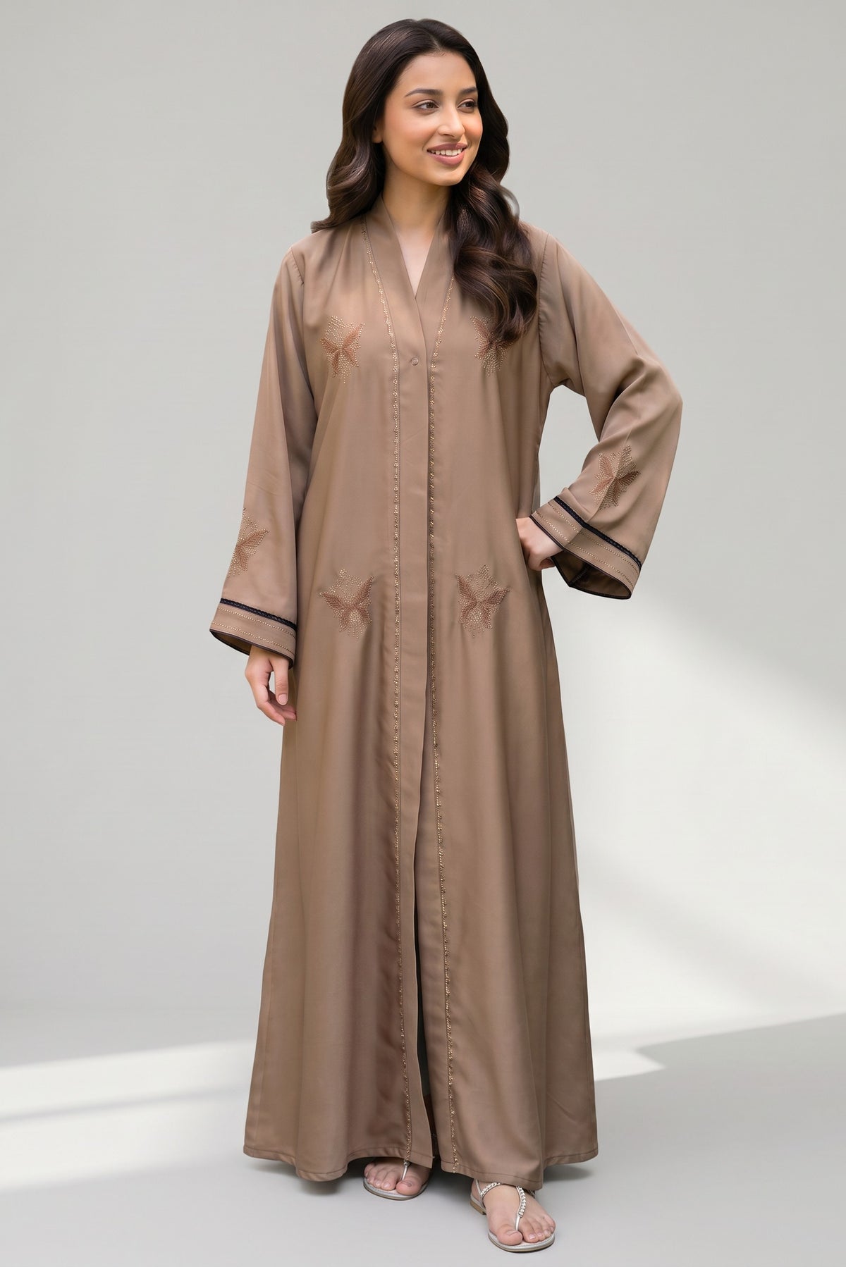 Close-up detail of Latte Botanical Open Abaya showcasing DMC stone motifs