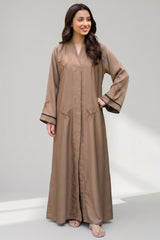 Close-up detail of Latte Botanical Open Abaya showcasing DMC stone motifs
