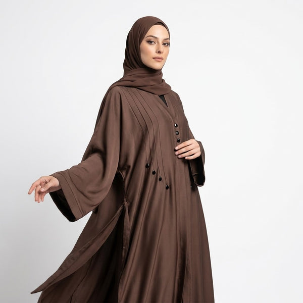Close-up detail of Mocha Brown Teardrop Studded Coat showcasing pintucks and teardrop studs