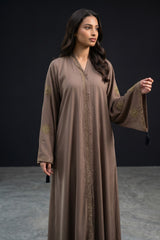 Styled front view of Mocha Brown Celestial Abaya with sunburst sleeve embroidery
