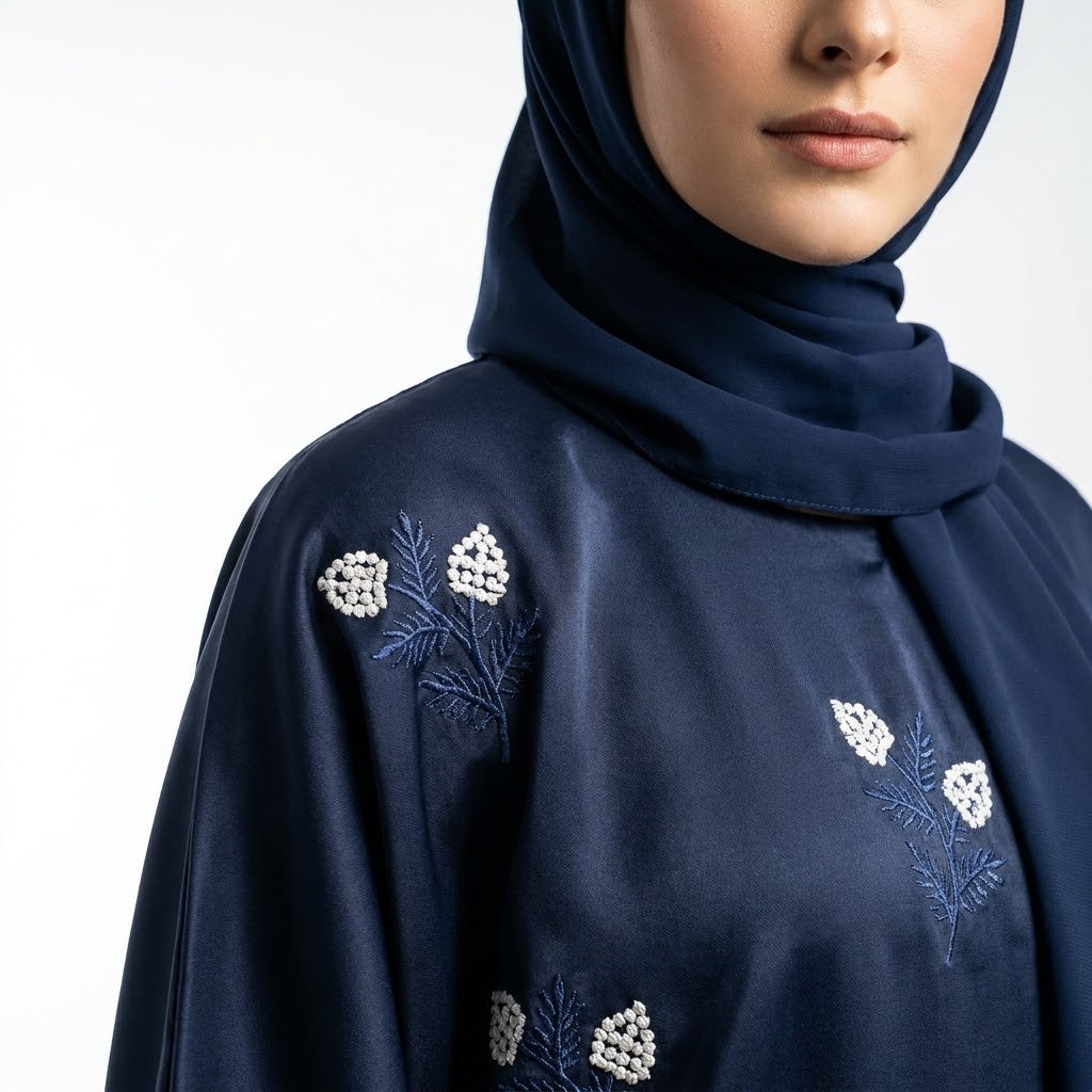 Front view of Navy Floral Sprig Nida Gown - closed pullover abaya with floral embroidery