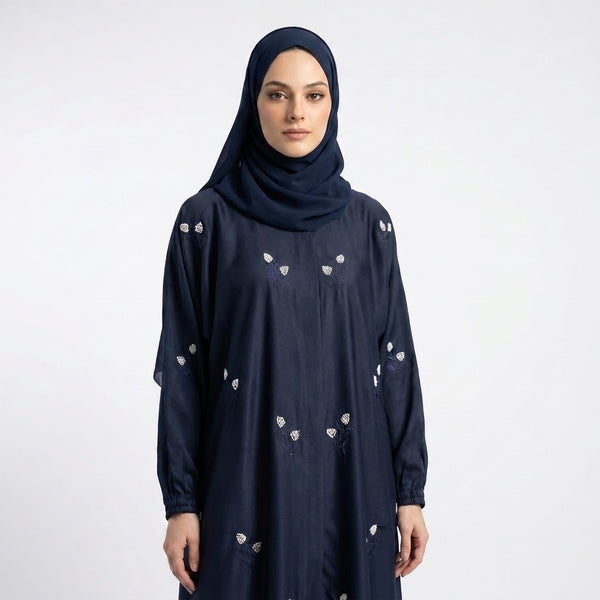 Close-up of Navy Floral Sprig Nida Gown showcasing white floral sprig embroidery