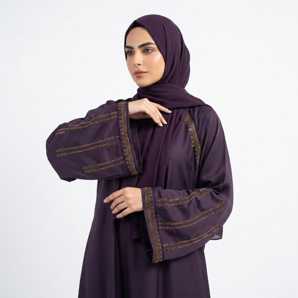 Close-up detail of Amethyst Luxe Raglan Abaya showcasing the design work