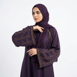 Close-up detail of Amethyst Luxe Raglan Abaya showcasing the design work