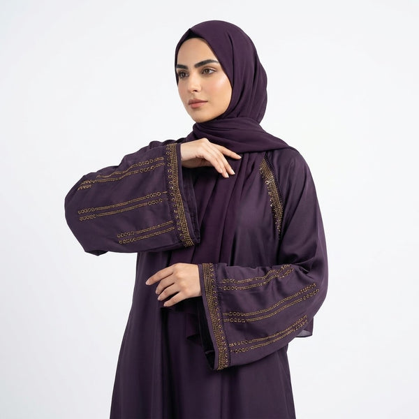 Close-up detail of Amethyst Luxe Raglan Abaya showcasing the design work