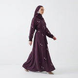 Close-up of Plum Floral Sprig Nida Gown showcasing off-white floral sprig embroidery