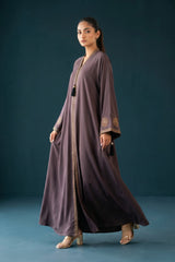 Close-up detail of Dusty Plum Celestial Abaya showcasing metallic thread and DMC stones