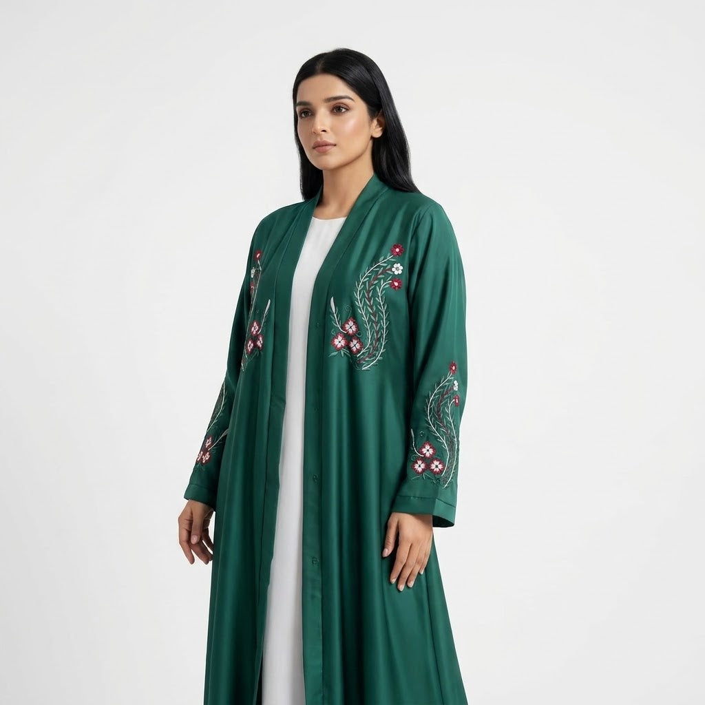Full-length view of Crimson Flora Paisley Coat in Deep Emerald Green base with Crimson Pink, Off-White, and Tonal Green thread embroidery